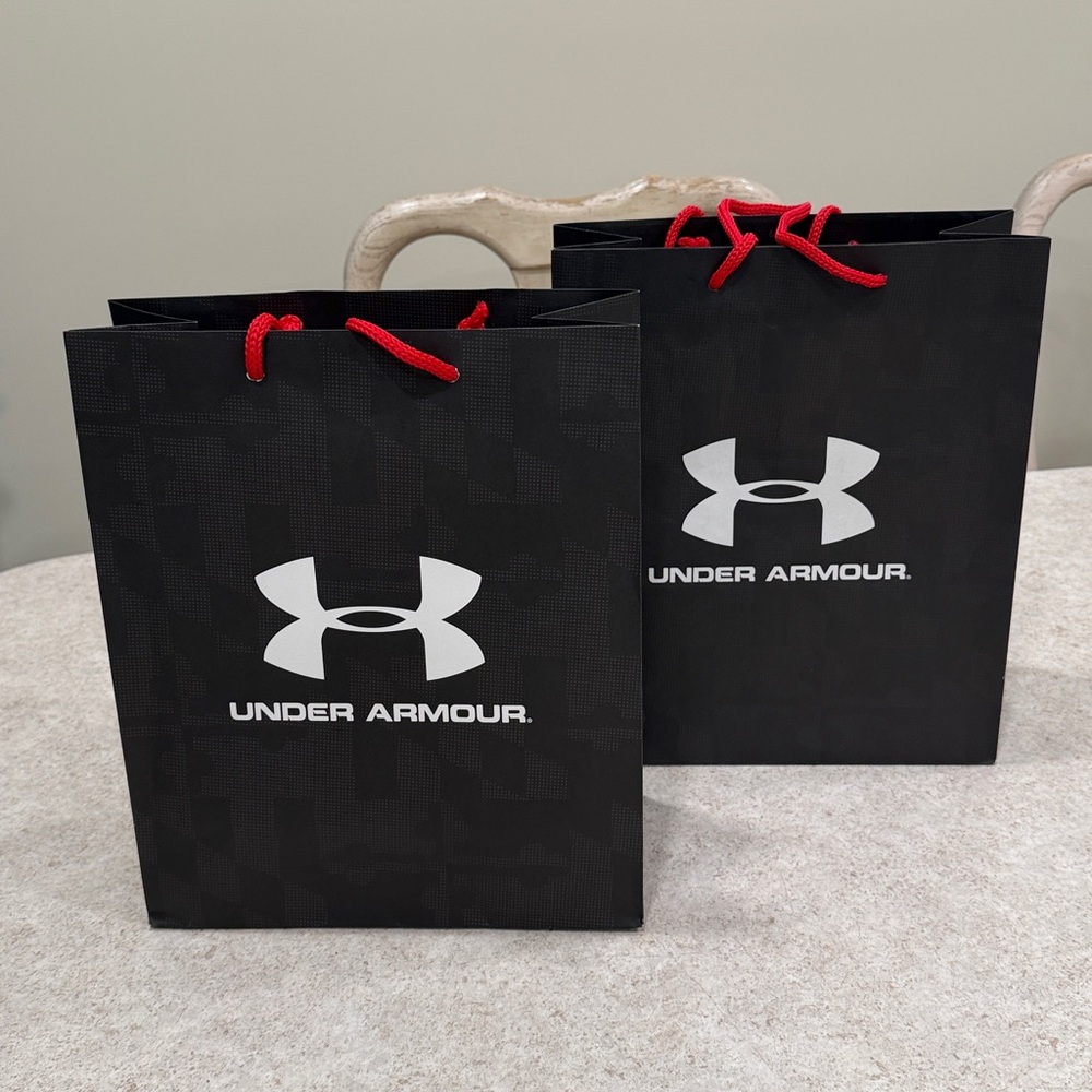2 UNDER ARMOUR EMPTY PAPER SHOPPING BAGS WITH RED ROPE HANDLES 10 x 12 x 4.75”